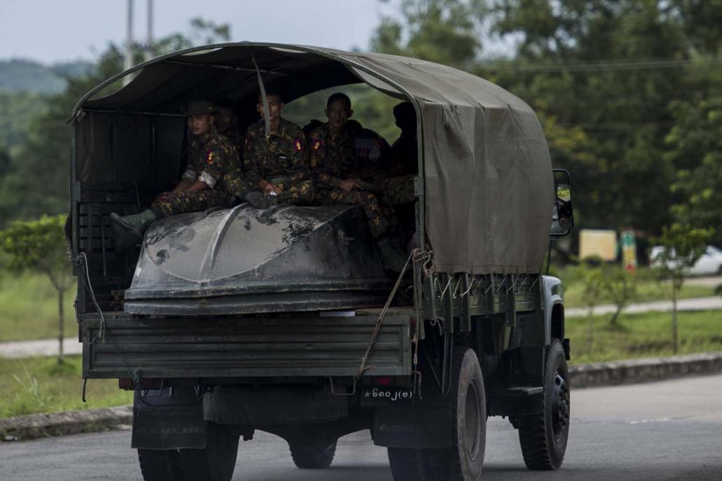 A convoy of military trucks passes through Bago Region on August 29, 2018. (AFP)