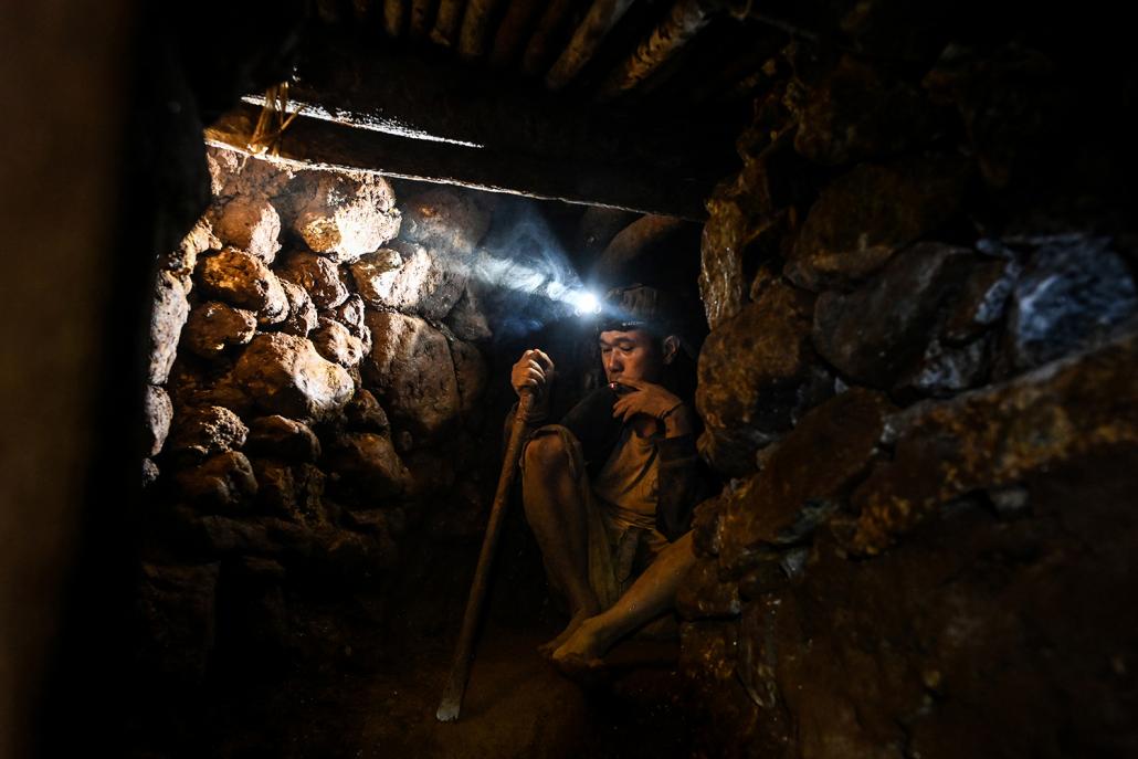 A miner works in a tunnel in a ruby mine in Mogok. (AFP)