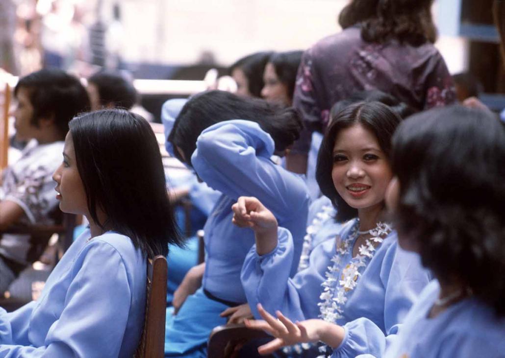 Young dancers prepare for a Myanmar New Year performance in Yangon in April 1980. (AFP)