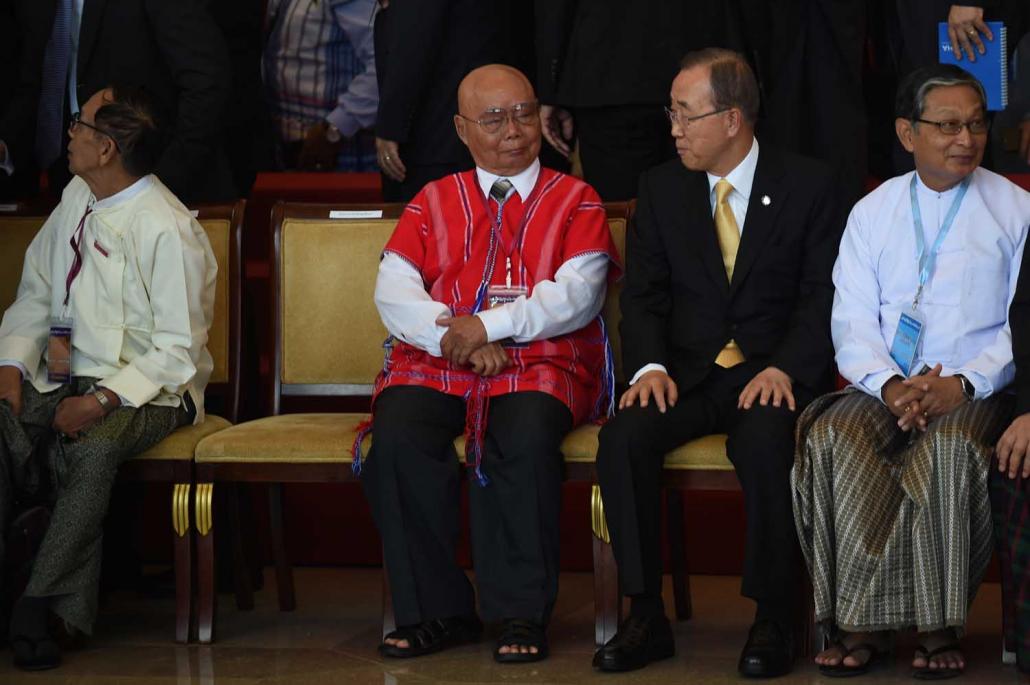 Karen National Union leader Saw Mutu Say Poe, left, sits beside then-UN Secretary-General Ban Ki-moon at the opening of the 21st Century Panglong Union Peace Conference in Nay Pyi Taw on August 31. (AFP)