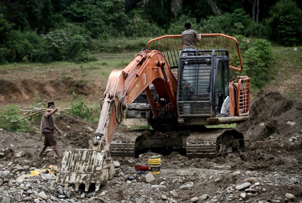 An excavator at a gold mine on Indonesia’s Sumatra island. (AFP)