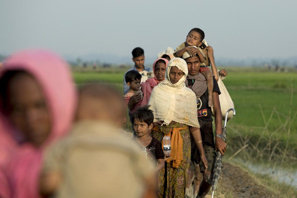 Displaced Rohingya refugees from Rakhine State walk near the border with Bangladesh on September 4, 2017. (AFP)