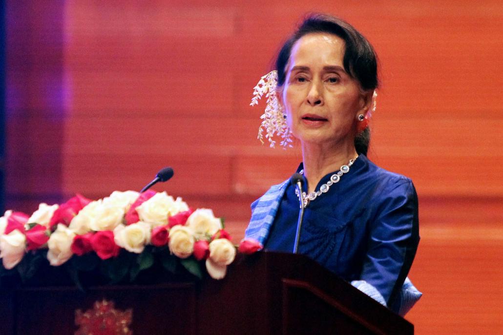 Daw Aung San Suu Kyi speaks during the NCA signing ceremony for the New Mon State Party and Lahu Democratic Union in Nay Pyi Taw on February 13. (AFP)