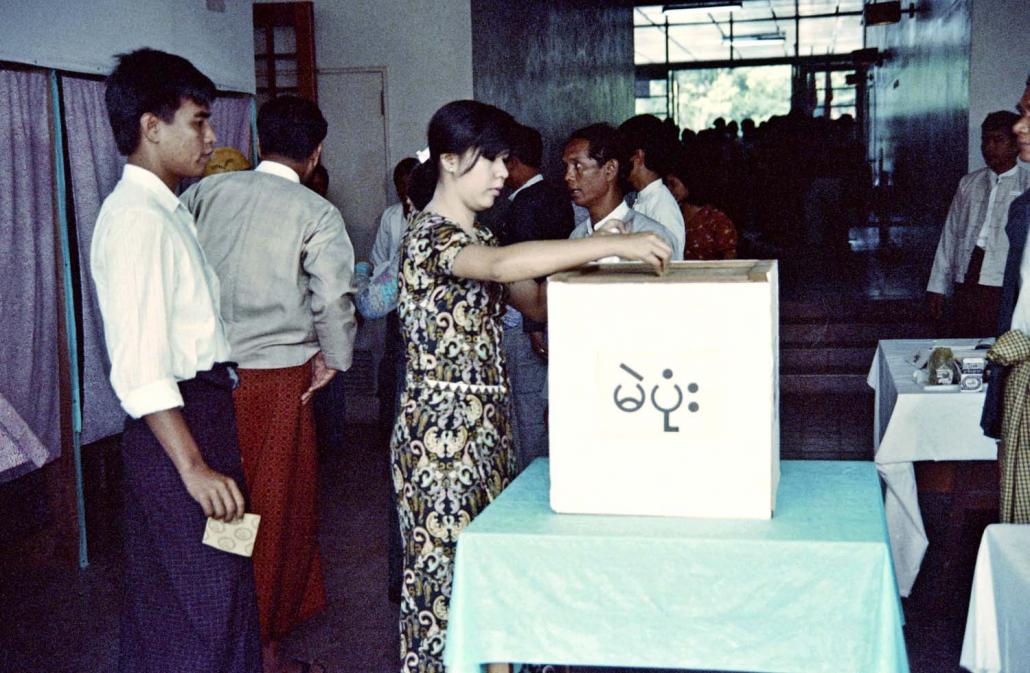Yangon residents cast their votes during the 1990 general election. Dr Sein Win won the seat of Pauk Khaung in Bago Region but went into exile later that year. (AFP)