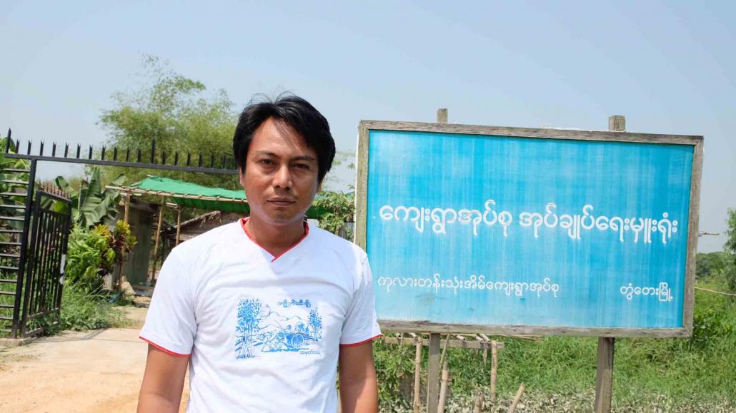 Ko Ne Win Shein, the administrator for Kalartan Thone Eain village tract in Twante Township. He says that most farmers have chosen to receive land as compensation instead of cash. (Kyaw Ye Lynn)