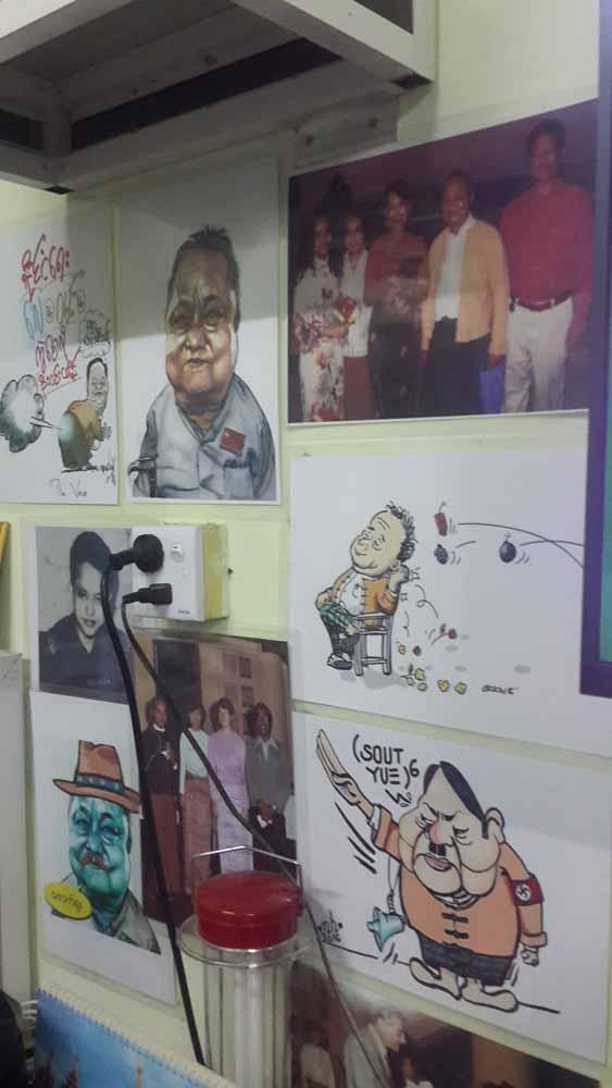 Cartoons making fun of U Win Htein line the wall at the municipal guesthouse in Nay Pyi Taw. (Nyan Hlaing Lynn / Frontier)