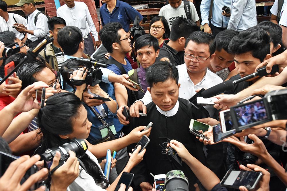 Lawyer U Than Zaw Aung with reporters after the verdict was handed down. (Steve Tickner | Frontier)