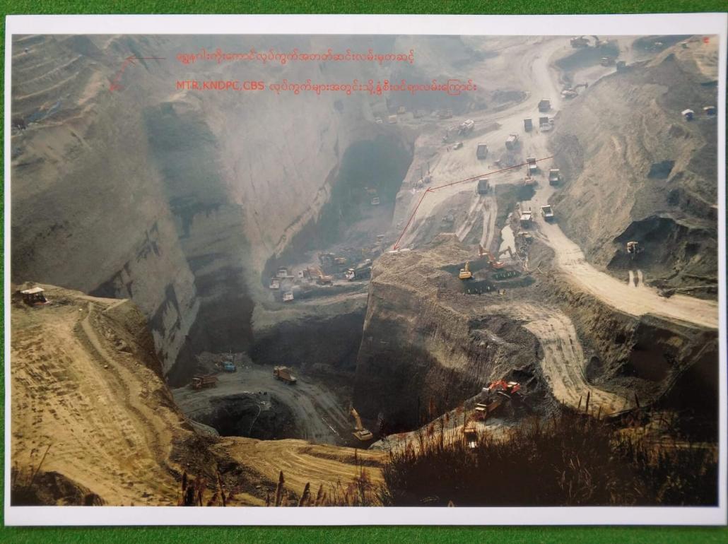 The passage (see red arrows) of the landslide into a mining pit, where it submerged at least 54 workers. (Zaw Moe Htet | Frontier)