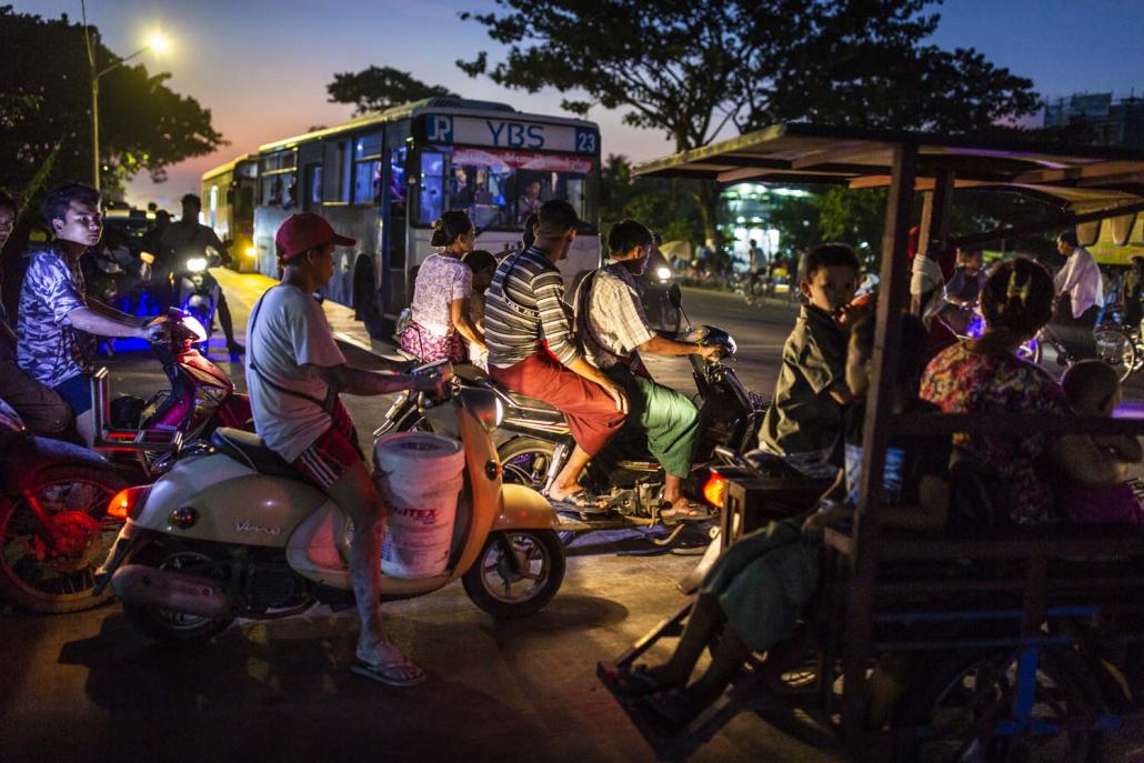 Motorbikes, though officially banned in Yangon, are everywhere in Hlaing Tharyar. (Hkun Lat | Frontier)