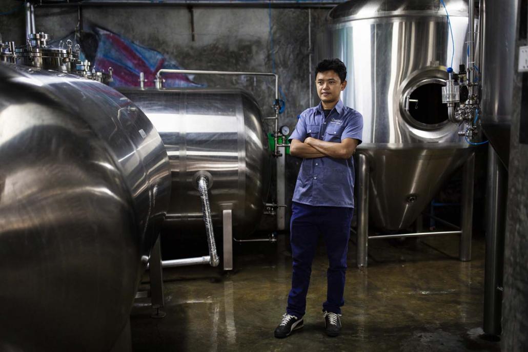 Ko Zaw Min Aung, head brewer at Burbrit. Three years after it opened, the country's first microbrewery is producing 10,000 litres a month, its founders say. (Hkun Lat | Frontier)