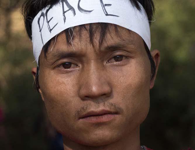 An ethnic Kayin man joins a protest in Lu Koh village on March 19 following clashes between the military and Karen National Liberation Army (Brennan O'Connor | Frontier)