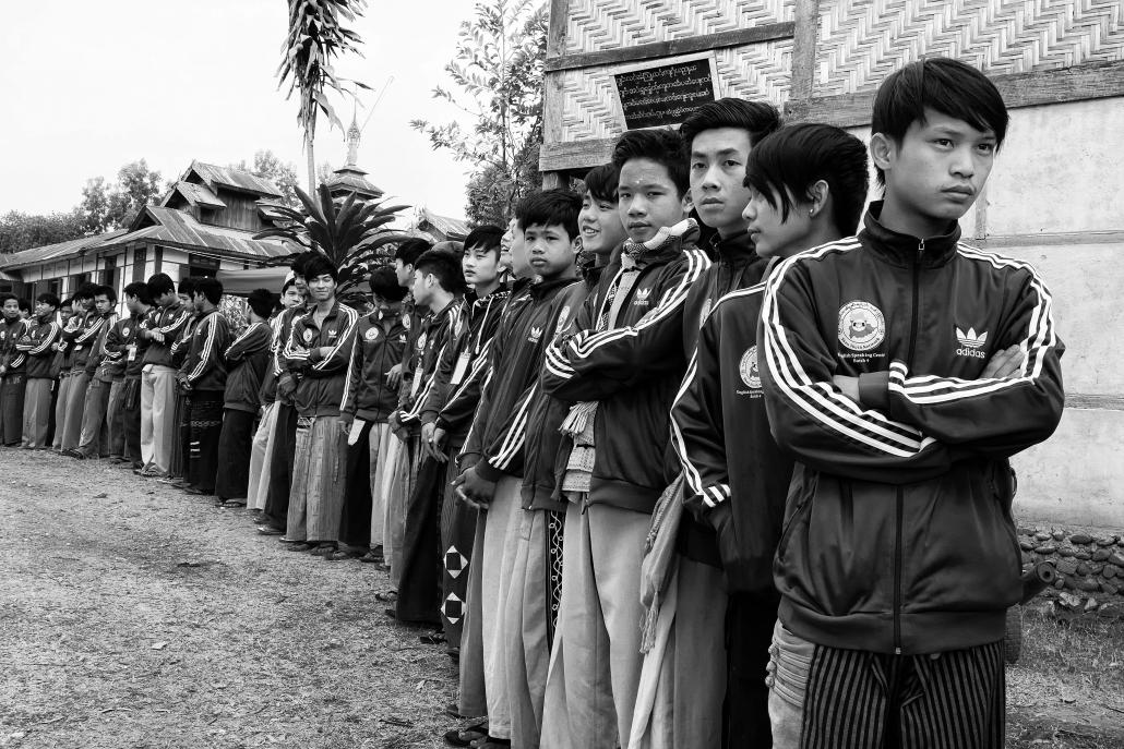 Students wait to greet guests during a graduation ceremony at the Shan Youth Network English School. (Brennan O'Connor / Frontier)