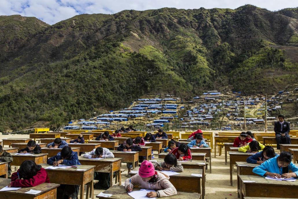 Youth displaced by conflict sit exams at the Hpare camp in Chipwi Township. (Hkun Lat | Frontier)