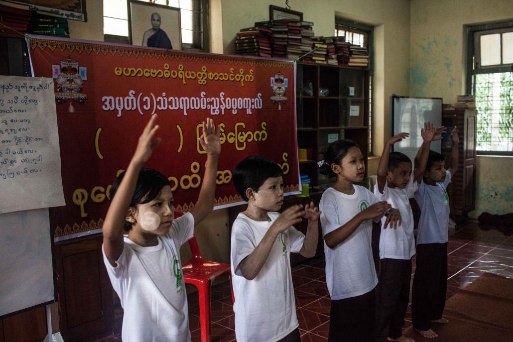 Children at the Mahabodhi Priyatti Dhamma school in Yangon's Yankin Township. (Lauren DeCicca / Frontier)