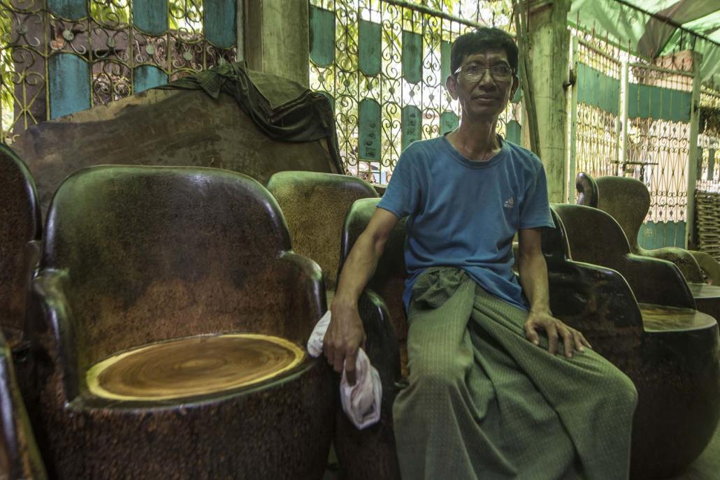 U Soe Soe Win inside his toddy palm sculpting business in Mandalay’s Amarapura Township. (Teza Hlaing | Frontier)