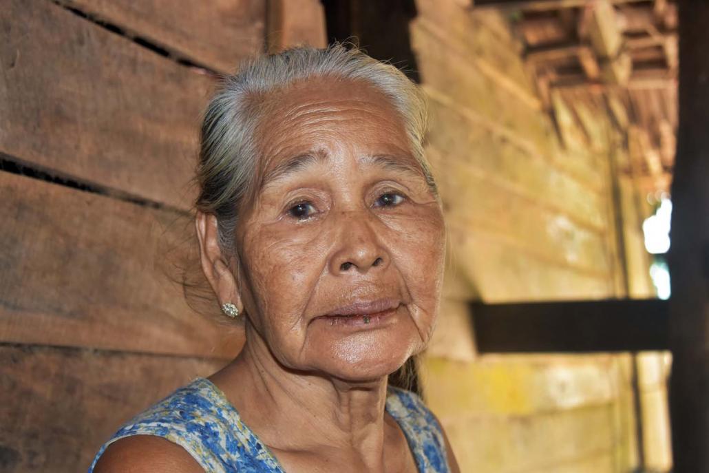 Daw Aye Phyu Ma, 75, and other residents of the northern section of Mu Rwing have been banned from the village’s market and using its well in the wake of the monastery dispute. (Su Myat Mon | Frontier)
