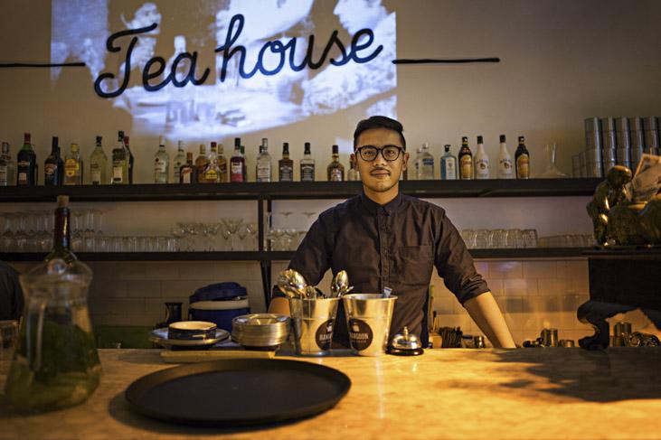 Htet Myet Oo poses in Rangoon Tea House, a restaurant in Yangon he started with two partners. At first, he relied on funds acquired from buying and selling property. (Andre Malerba / Frontier)