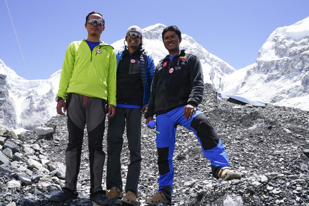 From left to right: Pyi Phyo Aung, Nyi Nyi Aung and Win Ko Ko pose for a photo near Mt Everest. (Nyi Nyi Aung)