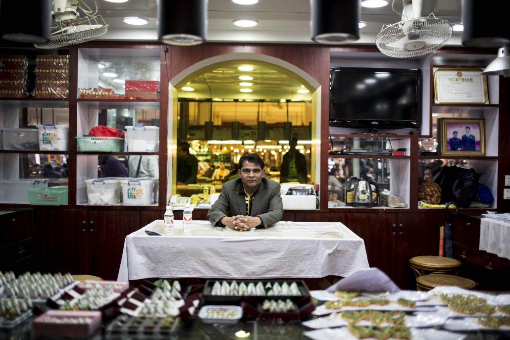 U Phone Kyaw at one of his jade shops in Ruili. (Ann Wang / Frontier)