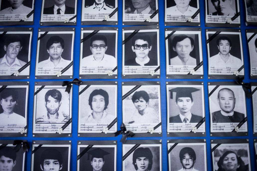 Photos of former Myanmar political prisoners at the Mae Sot offices of the Assistance Association for Political Prisoners. (Ann Wang / Frontier)