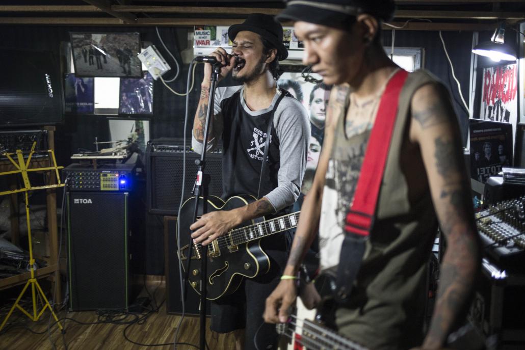 Musicians from the band No U Turn practise at their studio in Yankin. (Ann Wang / Frontier)