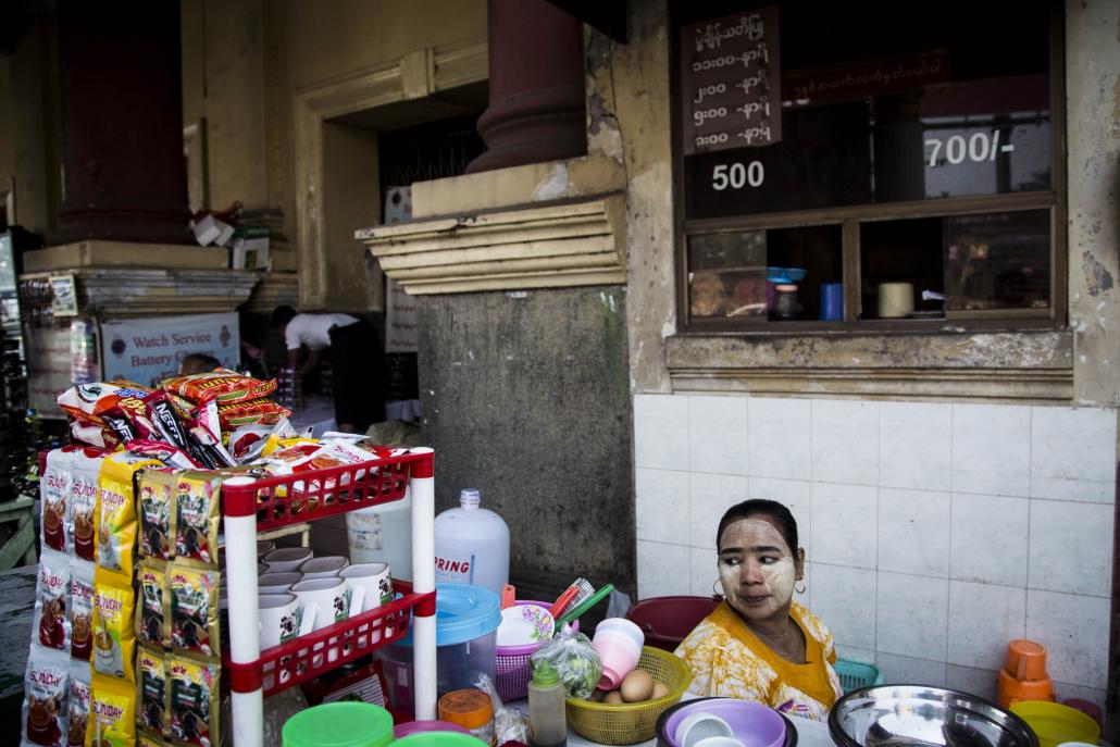 Vendors sell snacks outside Yangon's Waziya Cinema. (Ann Wang / Frontier)