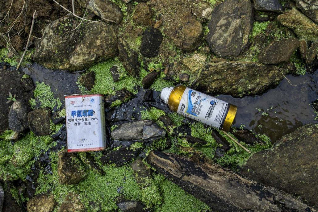 The ground of a tissue culture banana plantation in Mukchyaik village of Waingmaw Township was strewn with cartons of chemicals bearing instructions only in Chinese. (Hkun Li | Frontier)