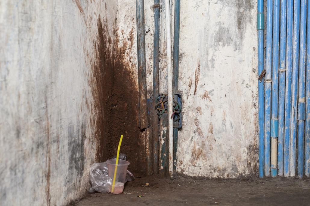 Betel stains in a staircase in downtown Yangon. (Chiara Luxardo / Frontier)