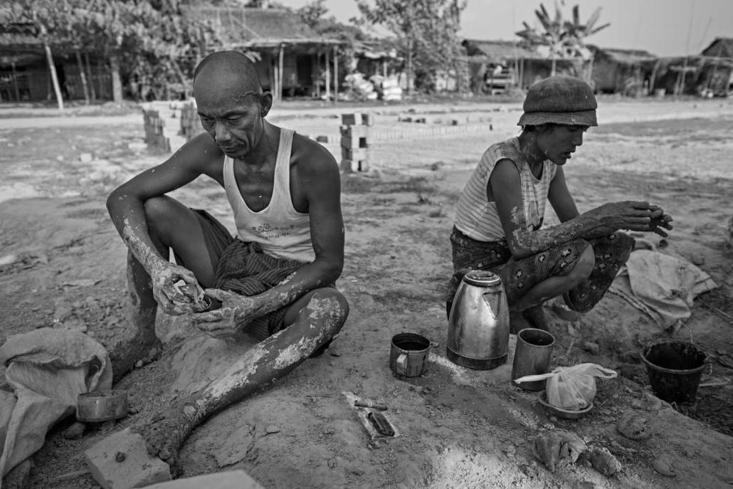 U Naing Lin sits during a break at the brick kiln in Hlegu Township in March 2016. (Andre Malerba | Frontier)