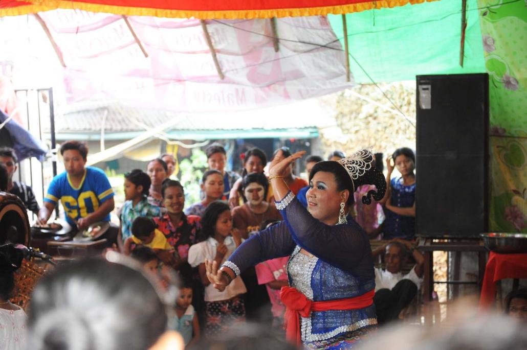 Nat kadaws function as mediums between the mundane world and spiritual realm of the nats, and perform at special festivals and other events wearing elaborate costumes and make-up. (Steve Tickner | Frontier)