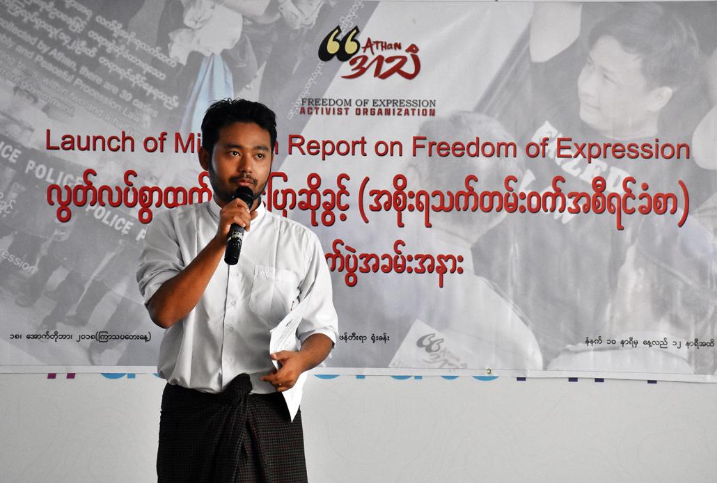 Athan founder Ko Maung Saungkha presents the report's findings in Yangon on October 17. (Steve Tickner | Frontier)