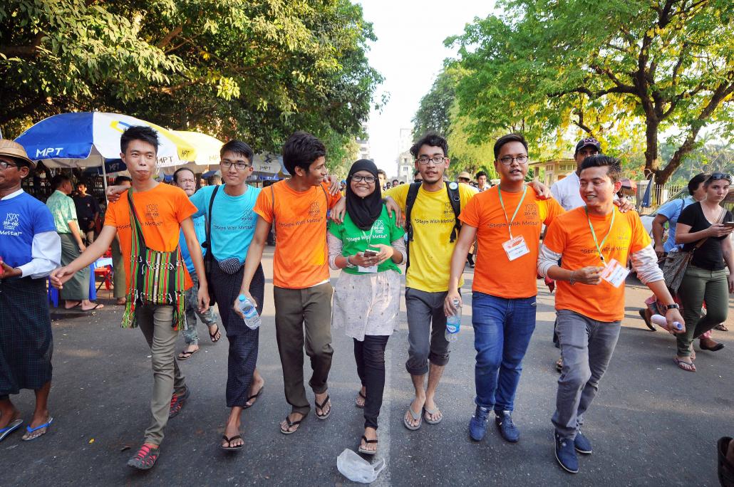 Participants take part in a multifaith march in downtown Yangon in May. (Steve Tickner / Frontier)