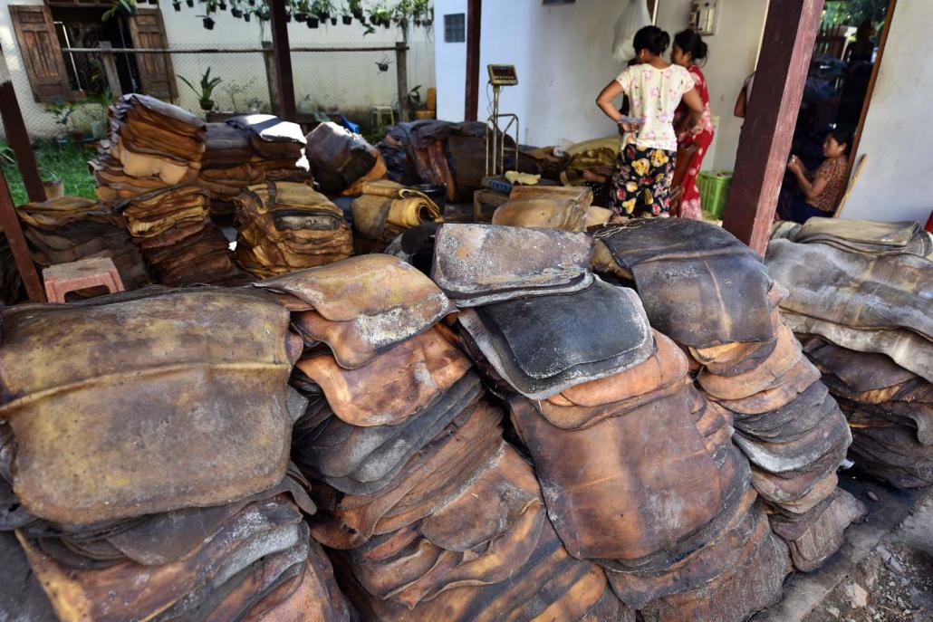 In September 2017, Mon State lawmakers approved a proposal to relocate or close private rubber factories near a village in Mudon Township, but the chief minister has refused to implement it. (Steve Tickner | Frontier)