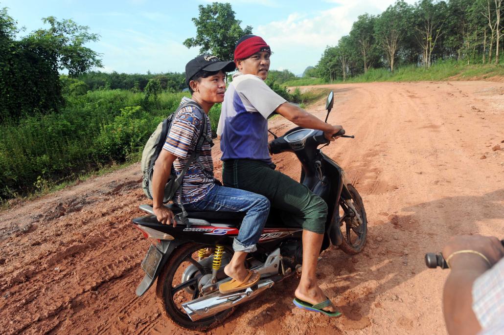 Lawi Weng, left, one of the reporters arrested in late June in northern Shan State after attending an event in territory controlled by the TNLA. (Steve Tickner | Frontier)