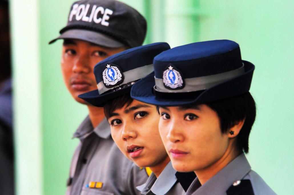 Police officers outside the Kyauktada Police Station in downtown Yangon. (Steve Tickner | Frontier)