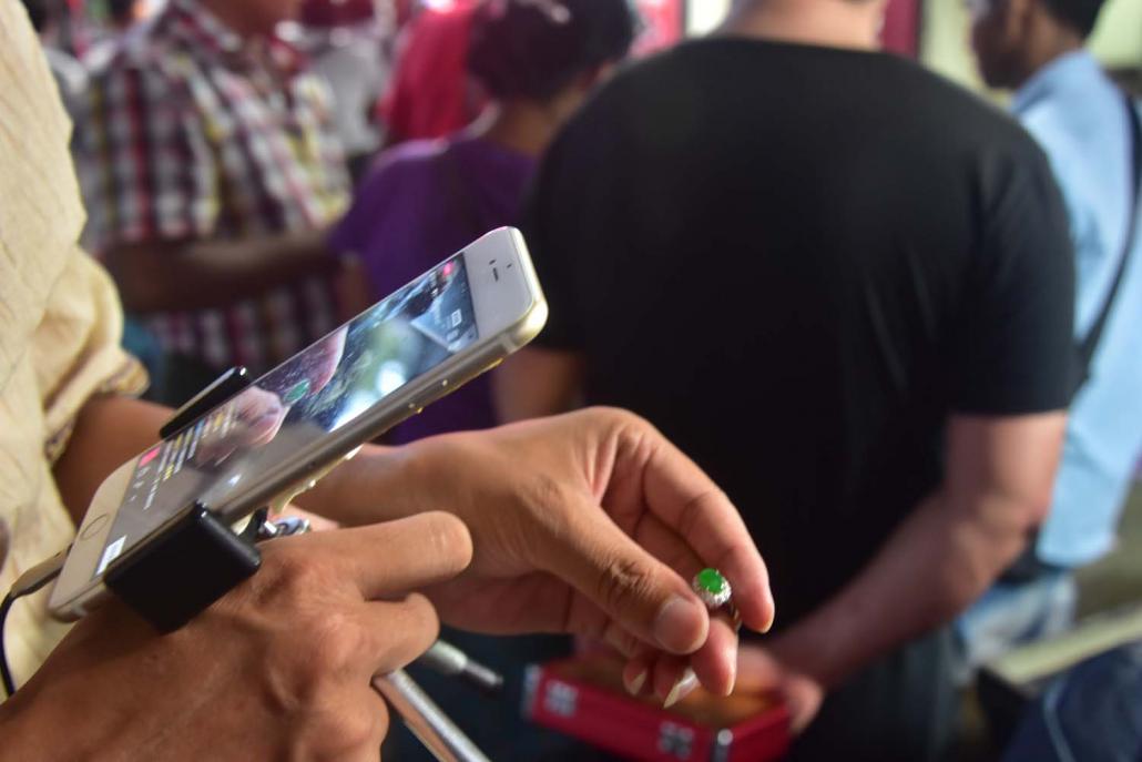 WeChat is used by around three-quarters of Chinese traders in the Mandalay market to communicate with potential buyers back home. (Kyaw Lin Htoon | Frontier)
