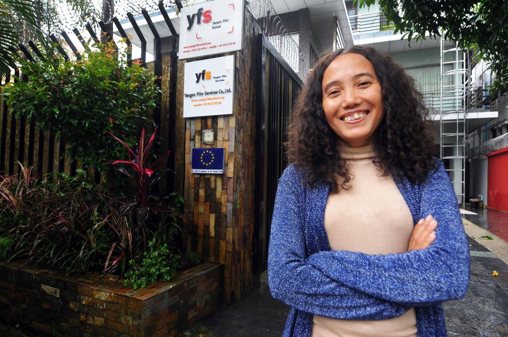 Ma Shin Daewe, a renowned documentary maker, outside the Yangon Film School in Yankin Township. (Steve Tickner / Frontier)