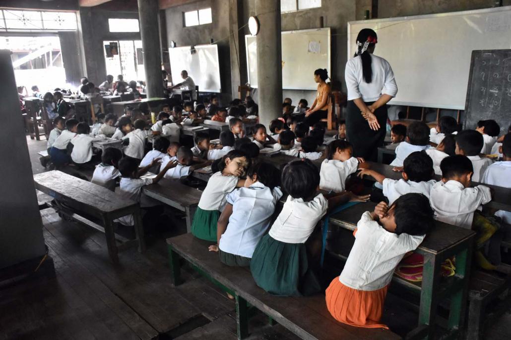 A class at the monastic school at Thirimingalar Monastery in East Dagon Township. (Steve Tickner | Frontier)