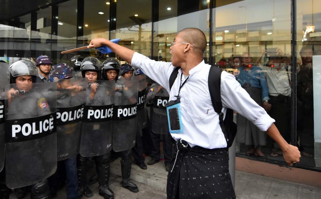 A peace rally in Yangon on May 12 turned violent when police moved in on protesters together with civilian vigilantes. (Steve Tickner | Frontier)