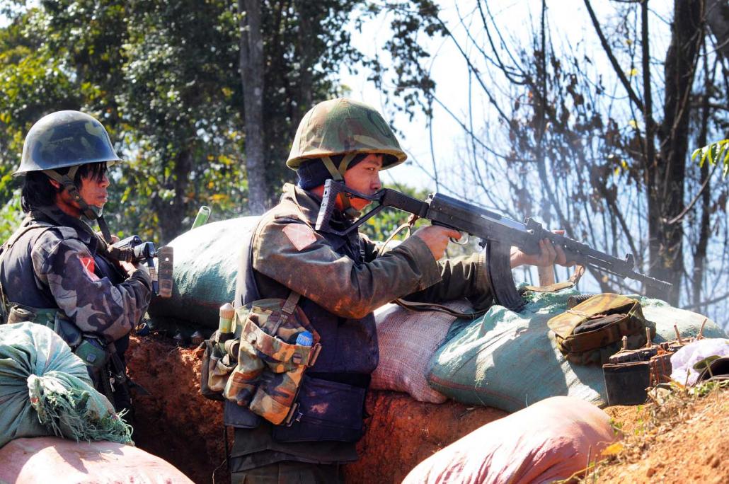 Soldiers from the Kachin Independence Army on the front lines near Laiza, Kachin State. (Steve Tickner | Frontier)