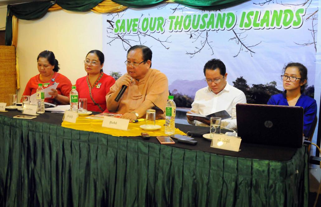 Speakers at a press conference in Yangon on September 28 explain their opposition to a series of proposed hydropower dams on the Thanlwin River. (Steve Tickner / Frontier)