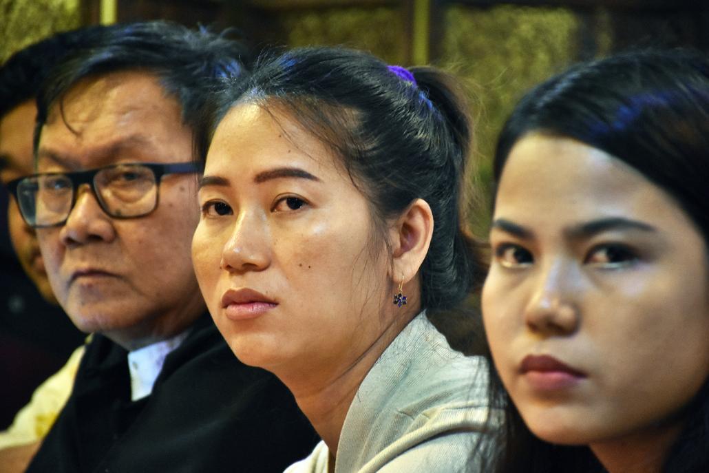 Lawyer Khin Maung Zaw (left), Wa Lone's wife Pan Ei Mon (centre) and Kyaw Soe Oo's wife Chit Su Win (right) speak at a press conference in Yangon on September 4. (Steve Tickner | Frontier)