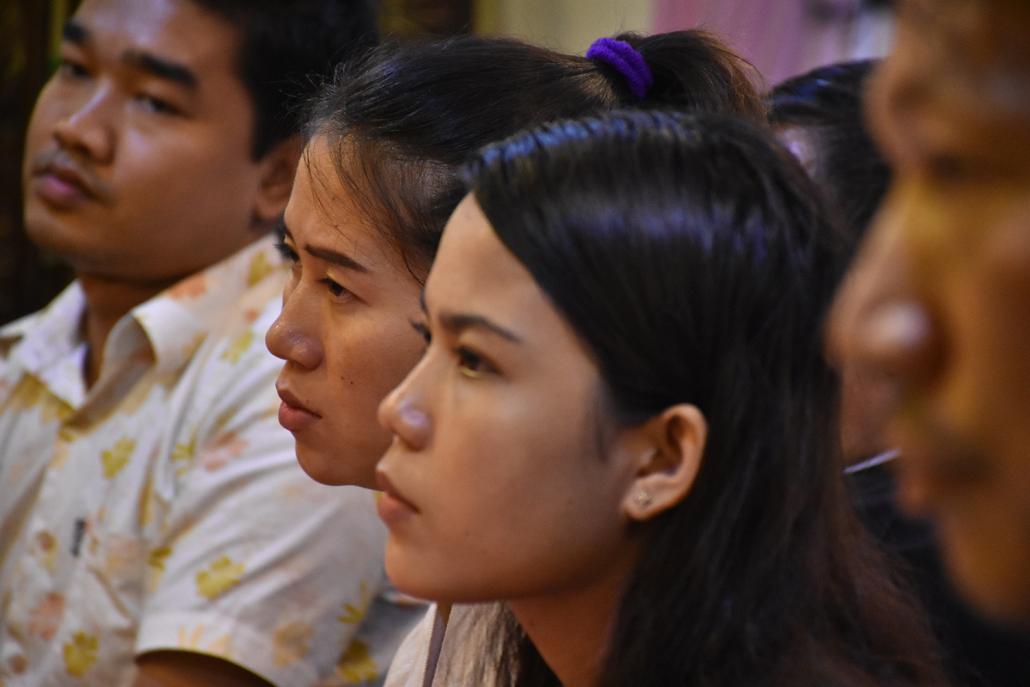 Wa Lone's wife Pan Ei Mon (left) and Kyaw Soe Oo's wife Chit Su Win (right) speak at a press conference in Yangon on September 4. (Steve Tickner | Frontier)