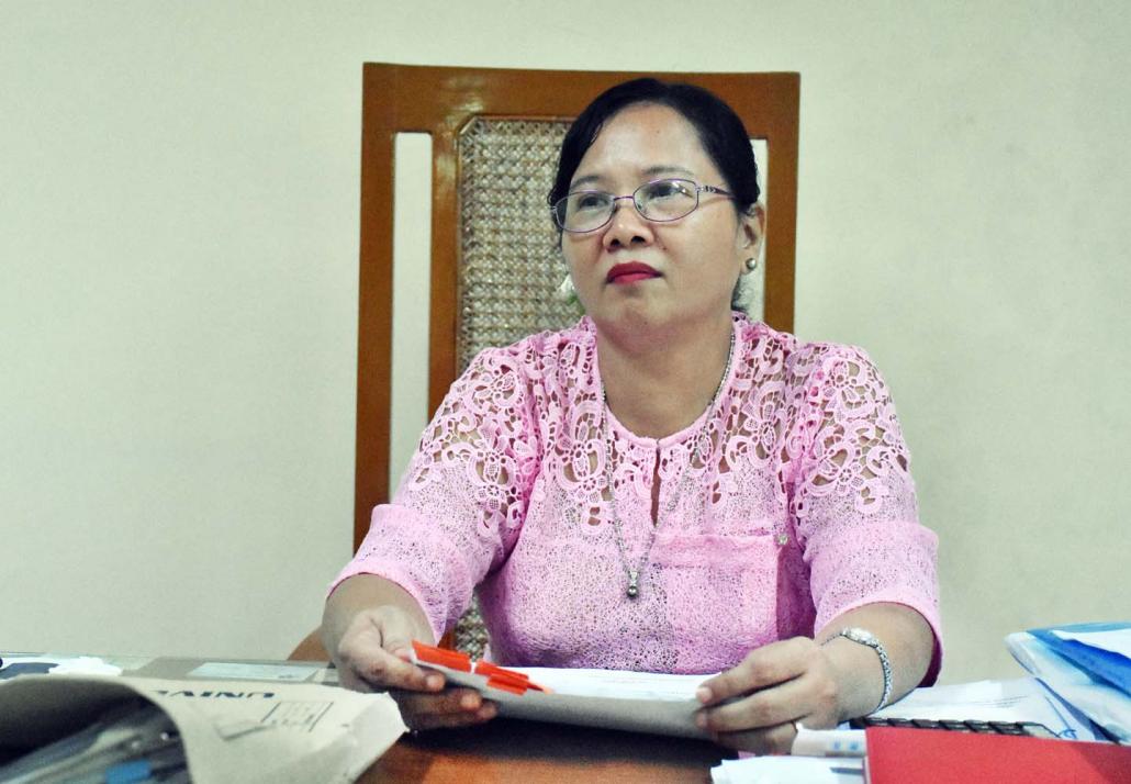 Daw Swe Swe Aung heads Yangon University's Administration and Finance Department. (Steve Tickner | Frontier)
