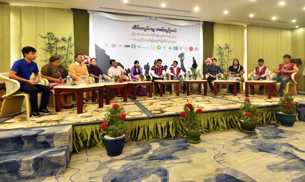 Members of ethnic-based civil society organisations that contributed to the report "There is no one who does not miss home" speak at the launch event in Yangon on June 20. (Steve Tickner | Frontier)