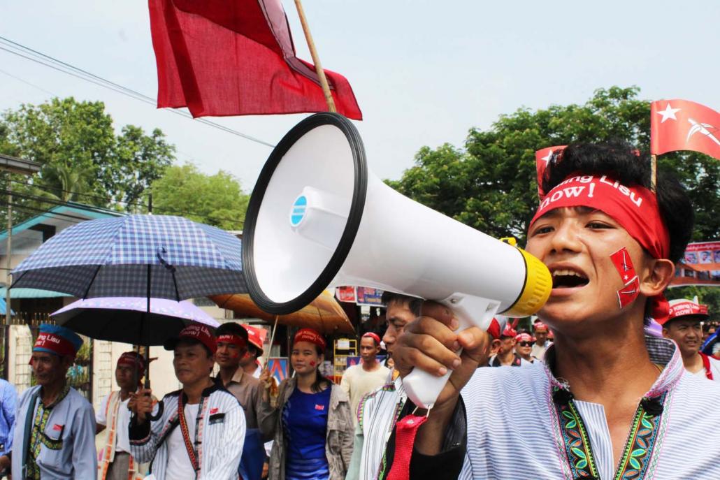 A 22-year-old Bible college student called Daniel protests in Myitkyina on June 3 against alleged killings and abuses of Lisu civilians by the Kachin Independence Army. (Emily Fishbein | Frontier)