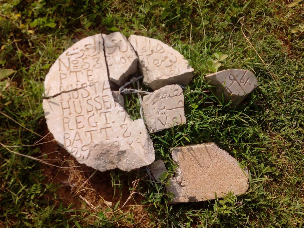 A broken headstone at the unrenovated cemetery in Meiktila. (James T Davies | Frontier)