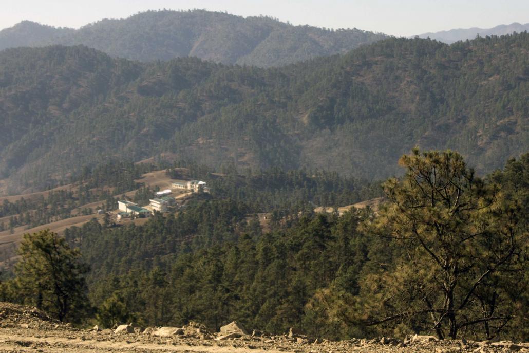 A view across the Chin hills to Hakha College, which opened in the state capital in December 2016. (Jared Downing | Frontier)