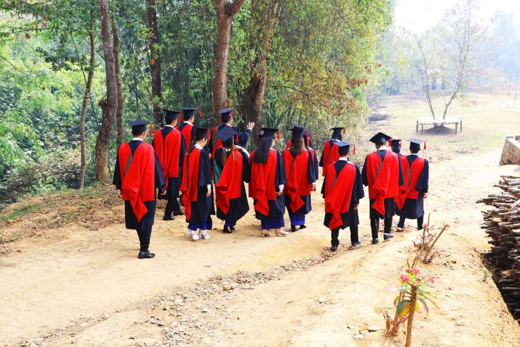 Students from the Institute of Liberal Arts and Sciences at Mai Ja Yang after a graduation ceremony in March. (Supplied)