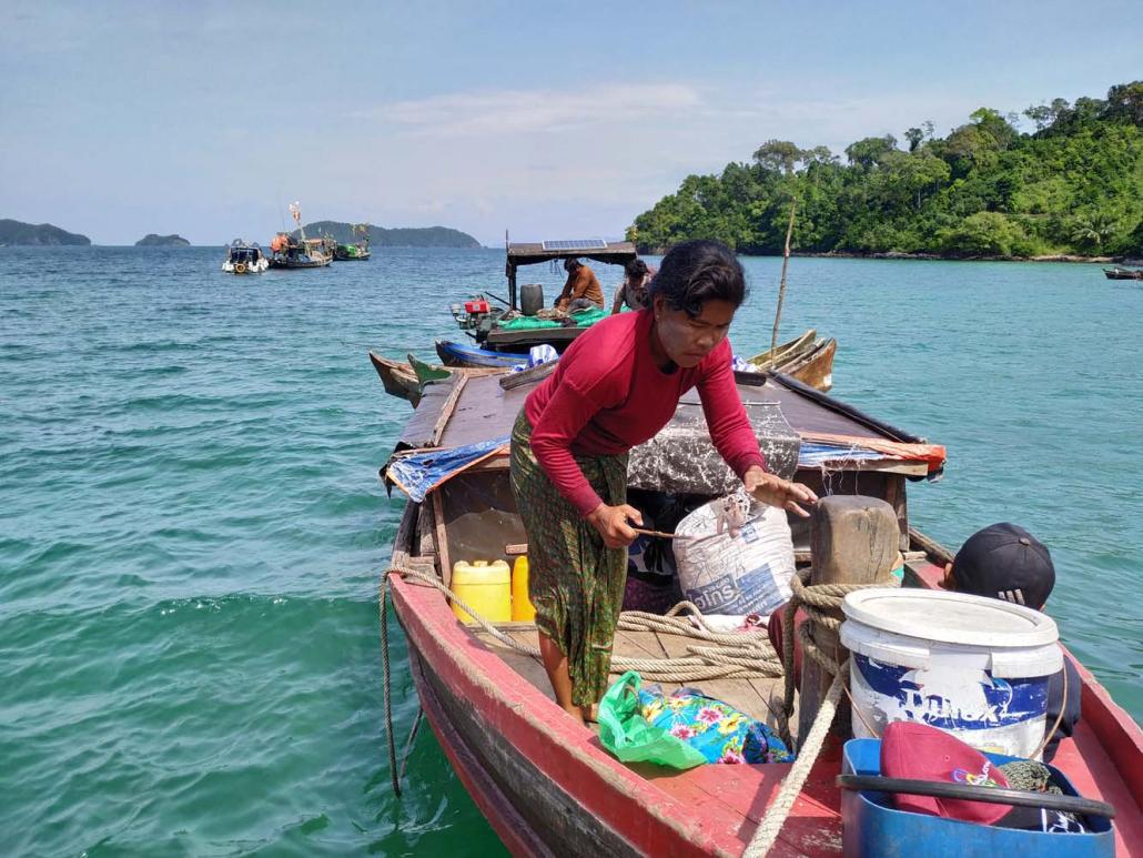 A Moken woman on a squid-catching expedition off Langan Island. (Hein Thar | Frontier)